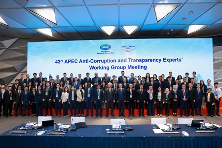 Group photo of representatives from each economy
